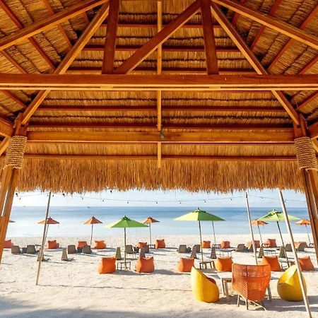 Oceanica Resort Panglao, Bohol Exterior foto The beach at the Hard Rock Hotel