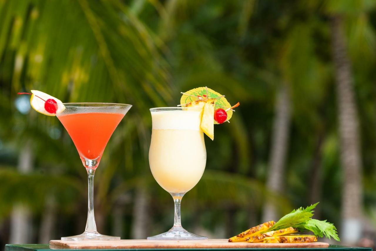Oceanica Resort Panglao, Bohol Exterior foto Two tropical drinks